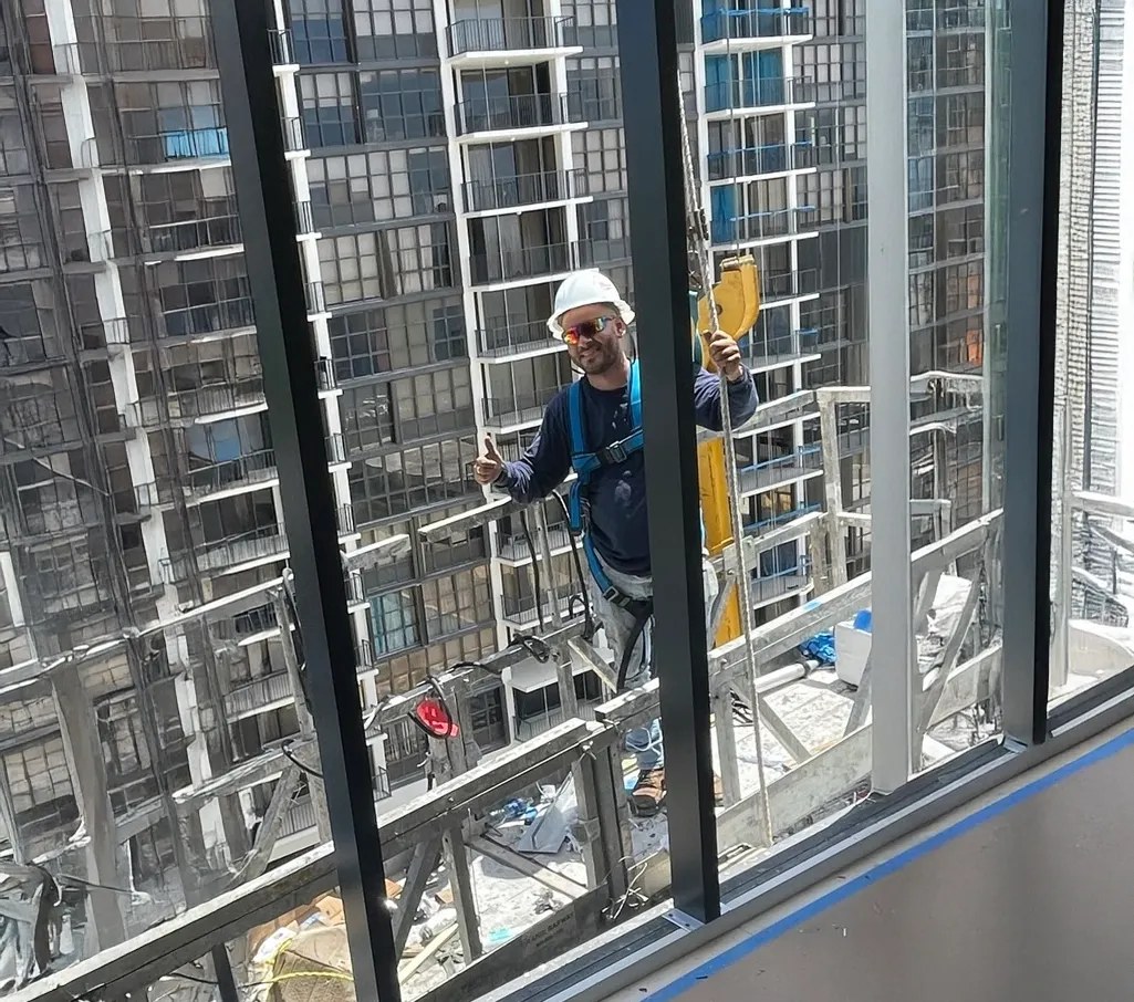 TISW technician at work on a suspended platform